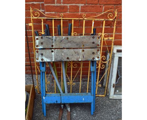 A quantity of tools, a metal gate and trellis