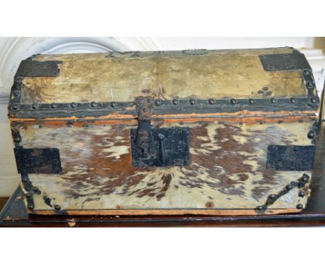 A small travelling trunk with inscribed initial "M.C."