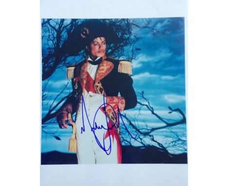 JACKSON MICHAEL: (1958-2009) American Singer. Signed colour 11 x 14 photograph of Jackson standing in a three quarter length 