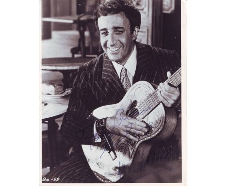 SELLERS PETER: (1925-1980) English Film Comedian. Signed and inscribed 8 x 10 photograph of Sellers seated in a three quarter