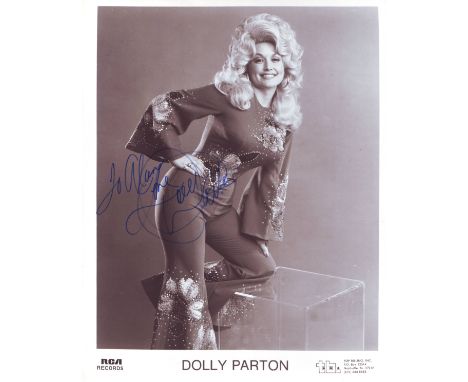 PARTON DOLLY: (1946-     ) American Singer. Signed and inscribed 8 x 10 photograph of Parton in a full length pose. The RCA R