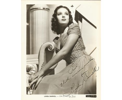 DARNELL LINDA: (1923-1965) American Actress. Vintage signed and inscribed sepia 8 x 10 photograph, a glamorous study of the a
