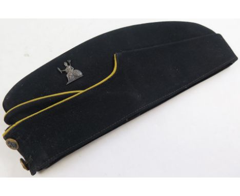 Badge and original black sidecap to the Norfolks, with original buttons and silver hallmarked 1942 cap badge (by J R Gaunt) 