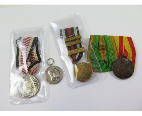 Imperial German Medals inc South West Africa non-combatants 1906. Franco Prussian War Medal with bars for Paris, Metz and Loi