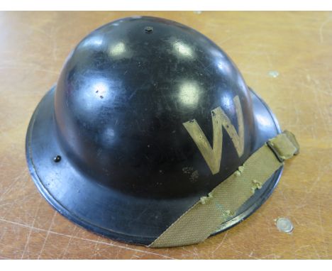 Helmet WW2 home front stencilled  on the front  W (wardens) complete with liner and chin strap  