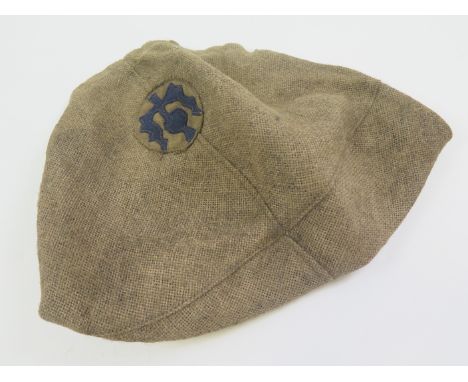 British WW1 Brodie Hessian Helmet cover with Scottish Divisional badge attached.