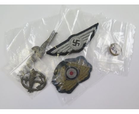 German items - unidentified SS white metal breast badge, makers mark "M1/34" to reverse. unidentified cloth "wings" breast ba