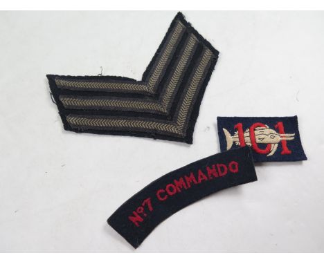 Cloth badges (3)101, No. 7 Commando & Sgt.'s Stripes. 