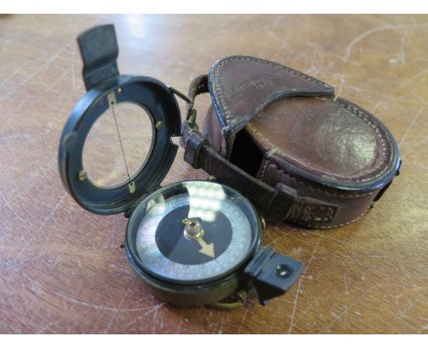 WW1 1917 dated pocket compass in its correct 1917 dated brown leather case  