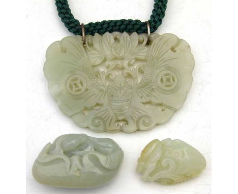 Carved jade butterfly pendant, diameter 8cm, on a braided rope; also a carved jade fish and a beetle (3) Condition report: se