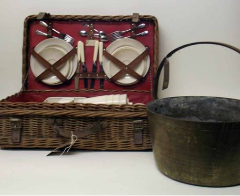 Brass jam kettle and coracle picnic hamper. Condition report: see terms and conditions.