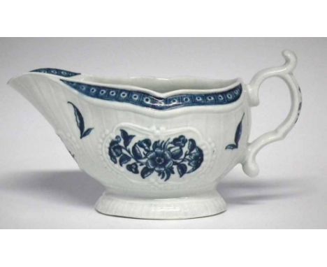 Worcester strap fluted sauceboat circa 1770   painted with floral sprays in underglaze blue, crescent mark to base, 19cm long