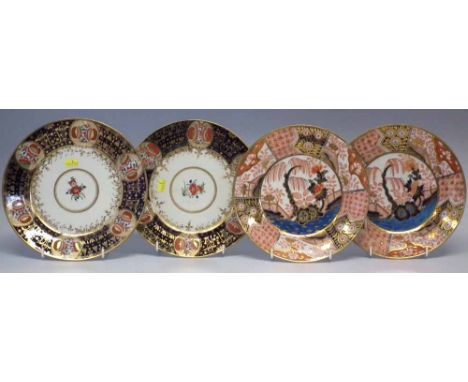 Two pairs of Chamberlains Worcester plates one pair painted with Japan pattern borders the other pair with Oriental garden sc