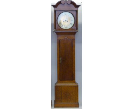 Oak longcase clock with a circular brass dial engraved Snapeton, Roman hours, Arabic minutes, eight day movement striking the