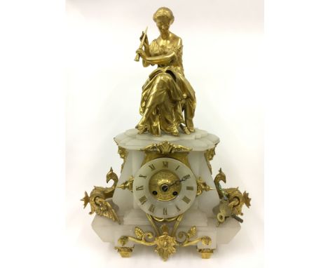 GILDED FRENCH FIGURAL MANTLE CLOCK ON A MARBLE BASE WITH GRIFFINS TO THE SIDES