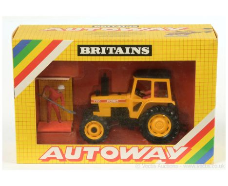 Britains Autoway? 9812 Ford 7710 Tractor yellow, black with driver figure, also comes with separate figure and shovel - Mint 