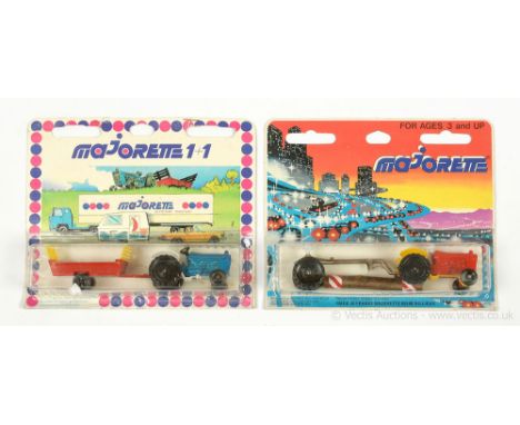 Majorette Twin Pack - a pair (1) containing Tractor - finished in blue, white mudguards with red trailer, yellow plastic rave