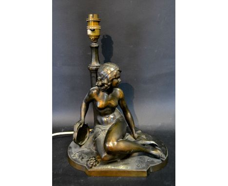 An Art Deco Style Spelter Table Lamp in the form of a girl with tambourine 