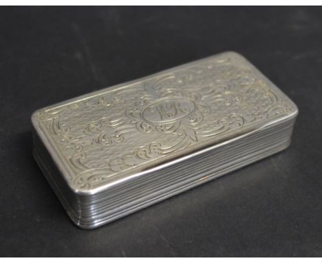 A Continental Silver Snuff Box of Rectangular Form, the top with engraved decorations and initials WR, 7 x 3.5 cms