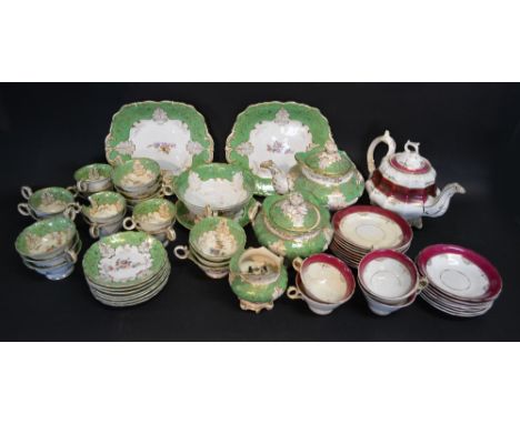 A 19th Century English Tea Service, comprising cups, saucers, teapot, bowls and dishes, together with a similar English tea s