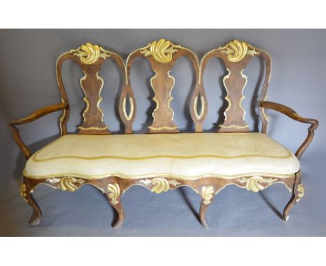 A Late 18th or Early 19th Century Triple Chair Back Sofa of Shaped Form, with a triple vase splat back above a shaped cream l