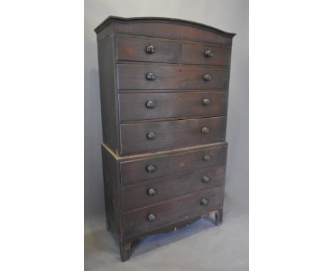 A 19th Century Mahogany Chest on Chest, the domed moulded cornice above two short and six long graduated drawers with knob ha