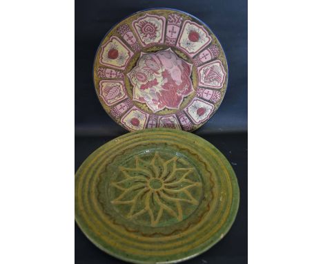 A 19th Century Enamel Decorated Dish impressed F.J. together with another pottery charger