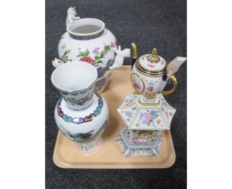 A tray of Franklin Mint oriental vase, House of Faberge teapot, another vase and a mantel clock