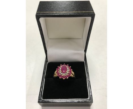 A 9ct gold synthetic ruby cluster ring, size P.