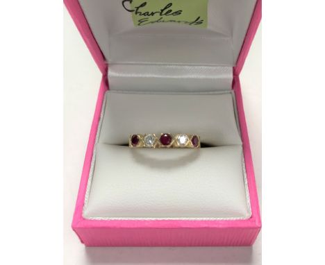 A 14ct gold synthetic ruby ring, size N/O.