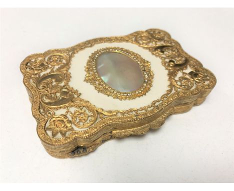 An ornate Italian gilt snuff box with mother of pearl inlay