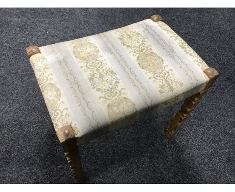 A blonde oak dressing table stool 