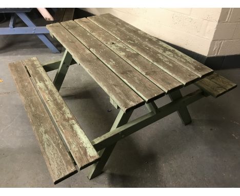 A fixed position wooden table and bench set, width 150cm