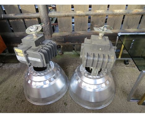 Two large industrial light fittings 