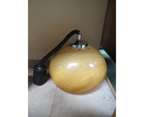A 1970's push n pull ceiling light 