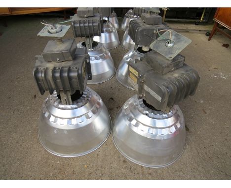 Two large industrial light fittings 