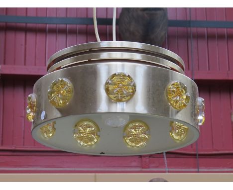 A Danish light brassed ceiling pendant light inset with amber glass roundels 
