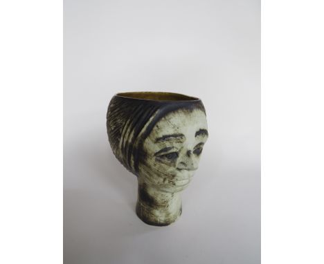 ANDRE LORET - A Devon pottery "head" planter, relief moulded features, 21cm high. Unmarked. 