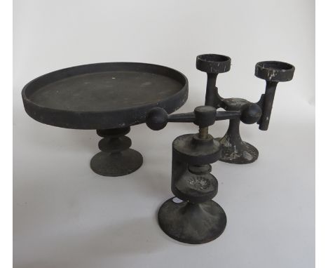 A Robin Welch cast iron tazza, candle holder (a/f) and nut cracker
