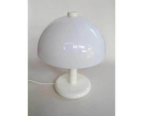 A white domed plastic table lamp 