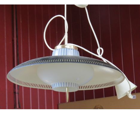 A large push/pull ceiling light in  black and white, pierced fret detail, glass under shade 