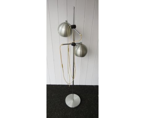 A chrome and aluminium standard lamp with twin globe adjustable spots 