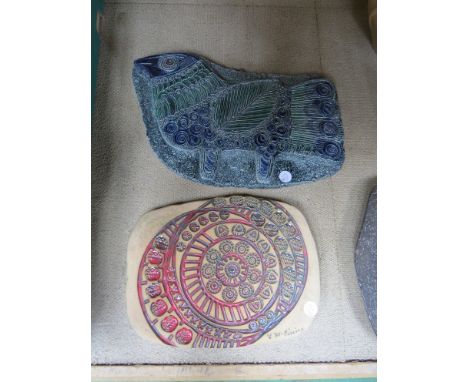 Two ceramic wall plaques, one depicting a bird. Impressed decoration  