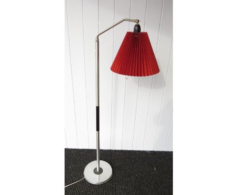 An aluminium and black reading standard lamp with adjustable single light 