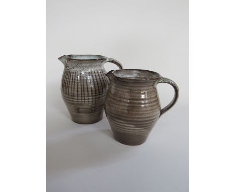 DAVID LEACH (1911-2005) A Studio pottery jug with speckled mocha glaze, impressed personal Seal. Together with a larger jug a
