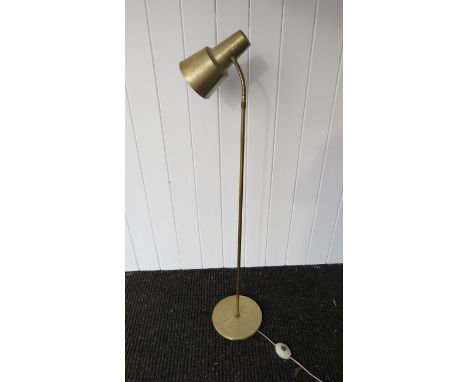 A brassed standard lamp with concal shade 