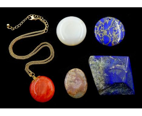 Lapis lazuli, jade and stone pendants and a piece of polished lapis lazuli stone - Condition Report 
