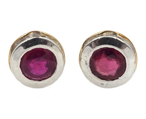 Pair of silver and 14ct gold wire ruby stud earrings, stamped 925 - Condition Report Diameter = 6mm 
