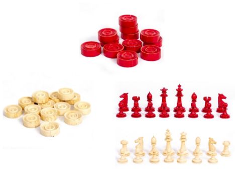 AN ANTIQUE TURNED BONE CHESS SET with one white pawn missing together with twenty seven backgammon pieces, a pair of turned i