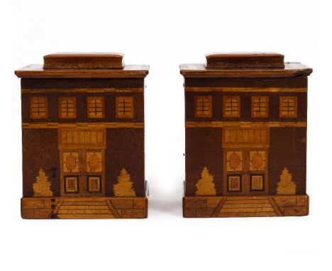 A PAIR OF MARQUETRY INLAID MONEY BOXES in the form of houses, each in the form of a puzzle box, 9.3cm wide x 11.2cm high (2) 